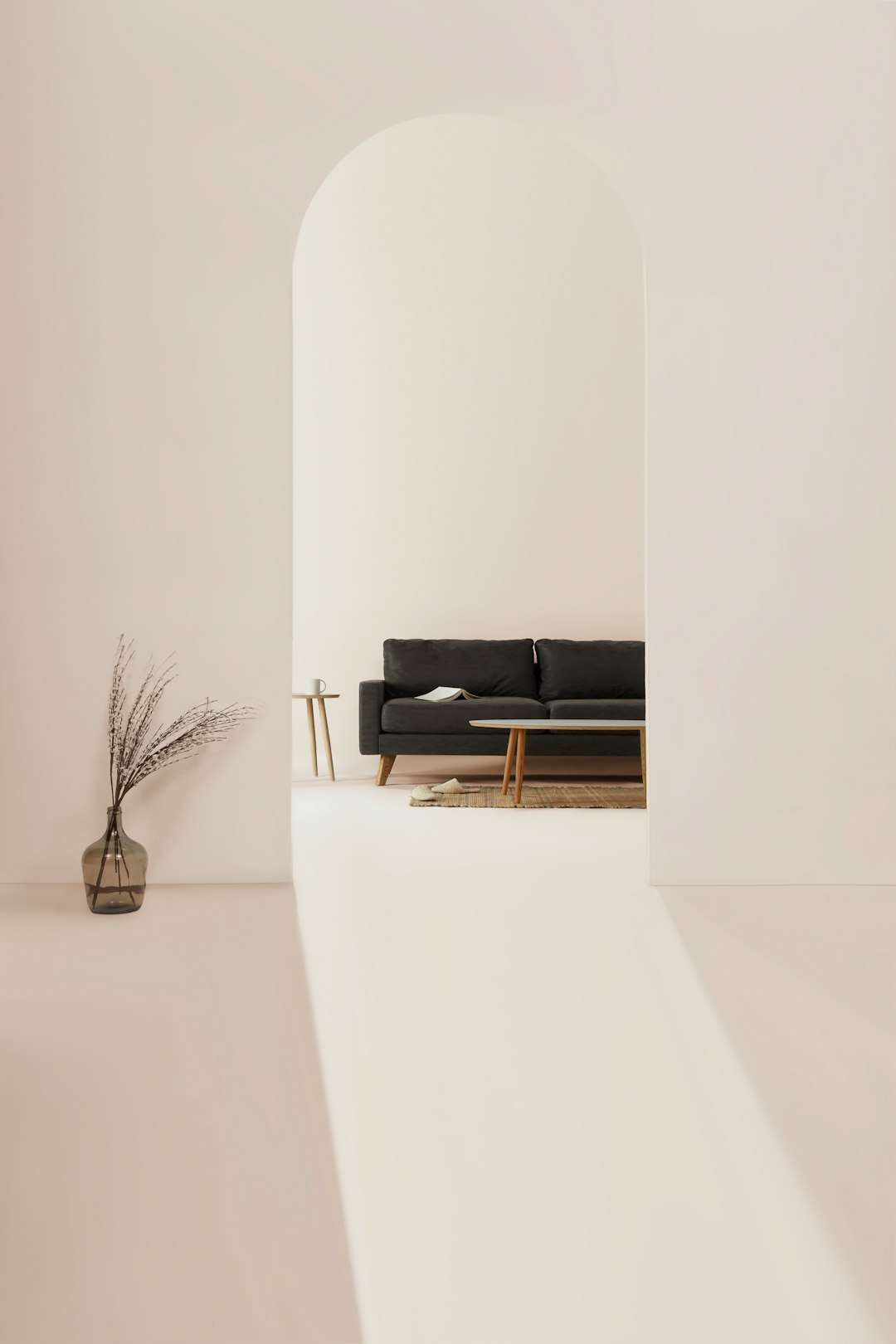 Salotto con divano grigio, tavolino e tappeto beige in stile contemporaneo Salotto con divano grigio, tavolino e tappeto beige in stile contemporaneo